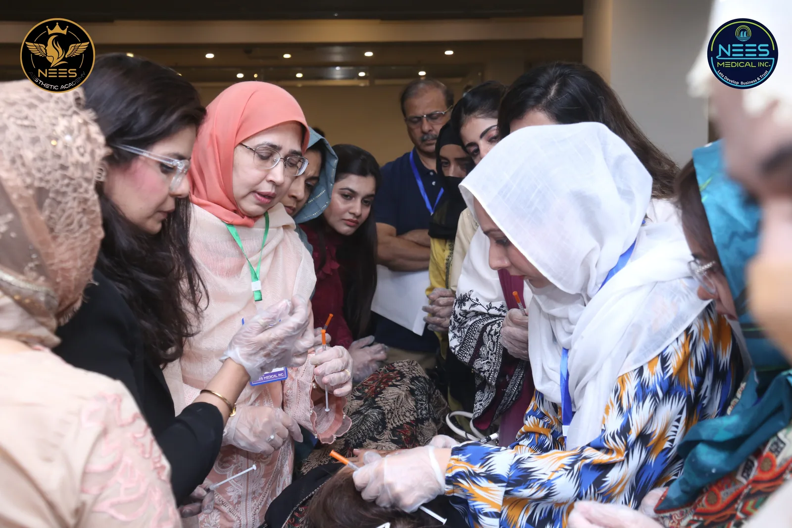 Hands-on training session with aesthetic professionals at the NEES Medical event.